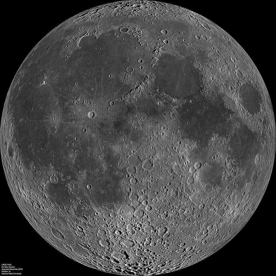The full near side of the moon, gray with dark plains and bright craters