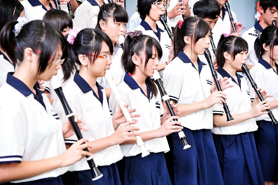 A school recorder ensemble playing together